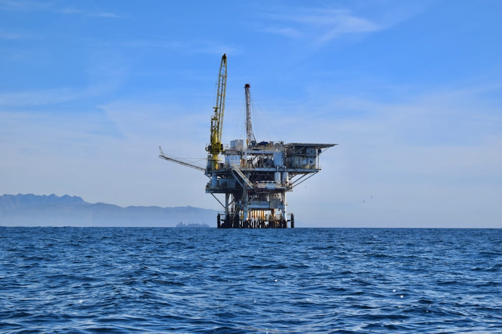 An offshore oil and gas production platform at sea