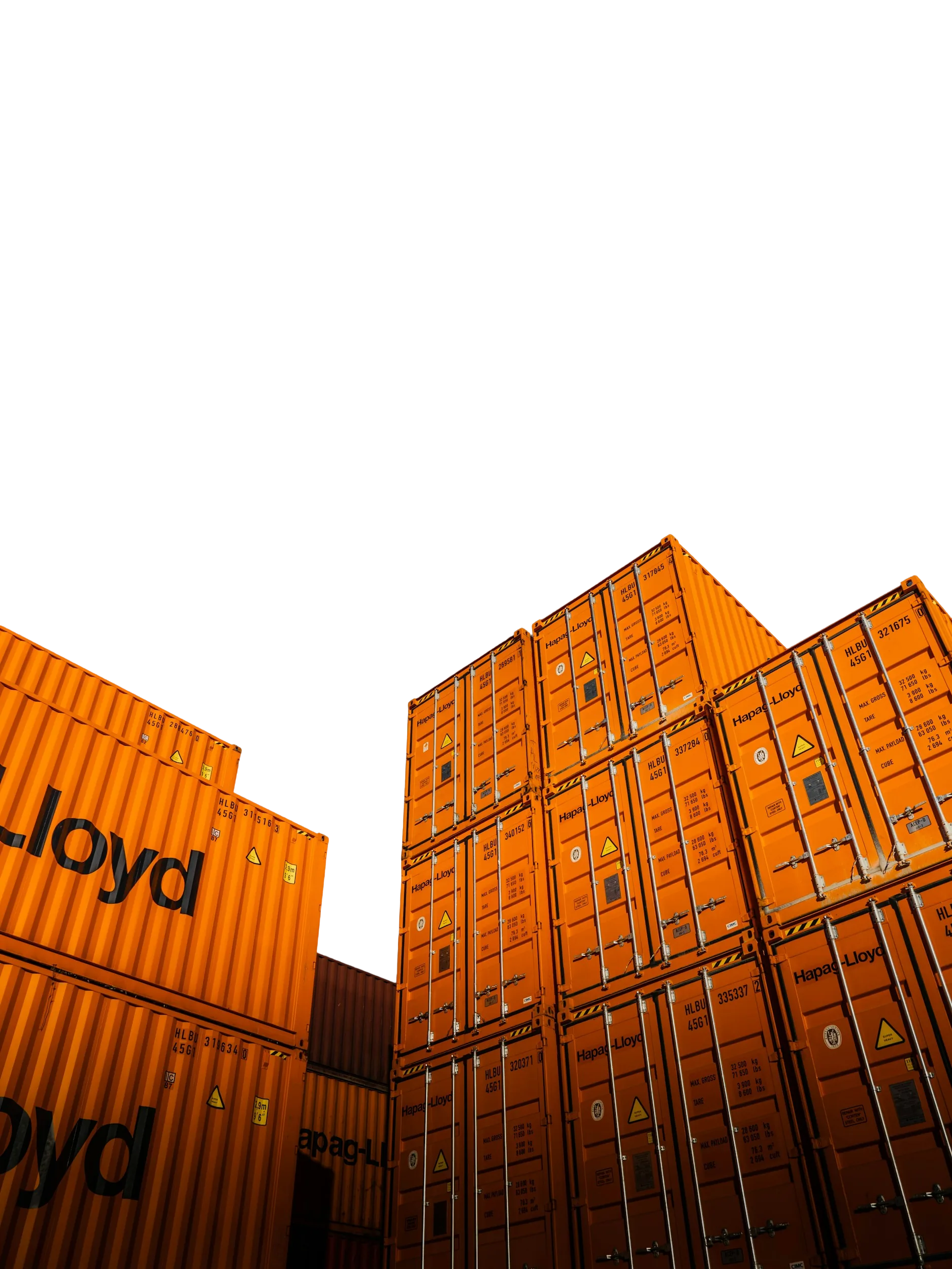 A stack of shipping containers at a port terminal